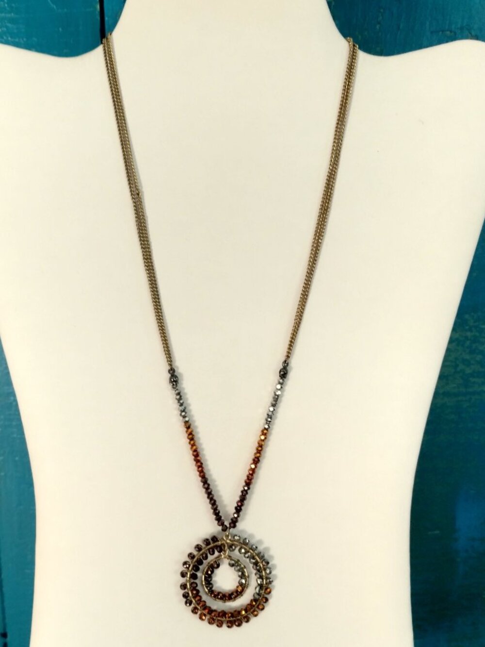 Kenneth Cole metallic beaded circle necklace